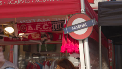 Stall-Selling-Club-Merchandise-Outside-The-Emirates-Stadium-Home-Ground-Arsenal-Football-Club-London-With-Supporters-On-Match-Day-7