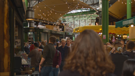 Inside-Borough-Market-London-UK-With-Food-Stalls-And-Tourist-Visitors-2