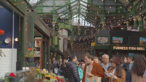 Inside-Borough-Market-London-UK-With-Food-Stalls-And-Tourist-Visitors-13