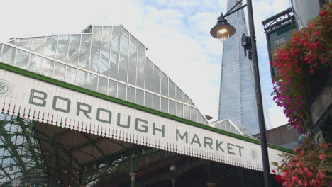 Exterior-Of-Borough-Market-And-The-Shard-With-Tourists-London-UK