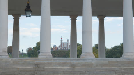 View-Of-Royal-Observatory-In-Greenwich-Park-Through-Pillars-Of-Old-Royal-Naval-College