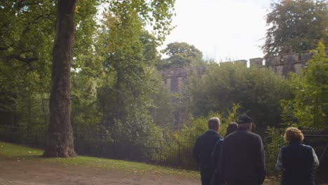 Autumn-View-Of-Bute-Park-In-Cardiff-Wales-With-People-Looking-At-Castle-Walls