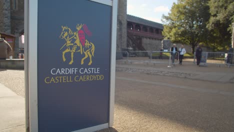 Advertising-Sign-Outside-Cardiff-Castle-With-Tourists-1