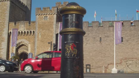 Bollards-Featuring-Knight-On-Horseback-Outside-Cardiff-Castle-In-Wales-With-Tourists-1