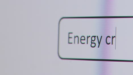 Close-Up-Of-Screen-With-Person-Typing-Energy-Crisis-Into-Computer-Search-Engine
