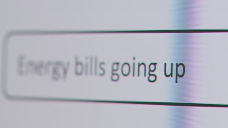 Close-Up-Of-Screen-With-Person-Typing-Energy-Bills-Into-Computer-Search-Engine-1
