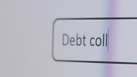 Close-Up-Of-Screen-With-Person-Debt-Collection-Into-Computer-Search-Engine