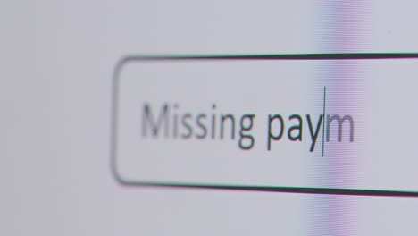 Close-Up-Of-Screen-With-Person-Typing-Missing-Payments-Into-Computer-Search-Engine