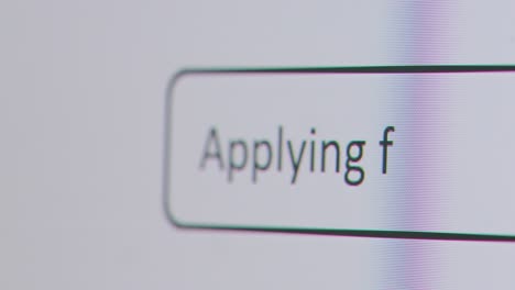 Close-Up-Of-Screen-With-Person-Typing-Applying-For-A-Loan-Into-Computer-Search-Engine