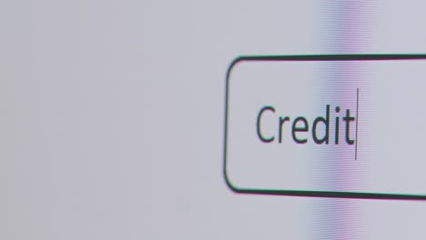 Close-Up-Of-Screen-With-Person-Typing-Credit-Cards-For-Bad-Credit-Into-Computer-Search-Engine