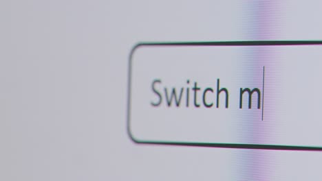 Close-Up-Of-Screen-With-Person-Typing-Switch-My-Mortgage-Into-Computer-Search-Engine