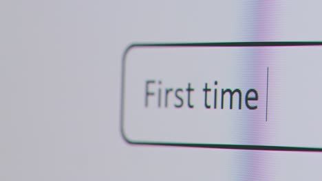 Close-Up-Of-Screen-With-Person-Typing-First-Time-Buyer-Help-Into-Computer-Search-Engine