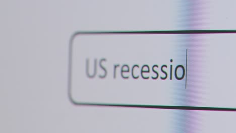 Close-Up-Of-Screen-With-Person-Typing-US-Recession-Into-Computer-Search-Engine