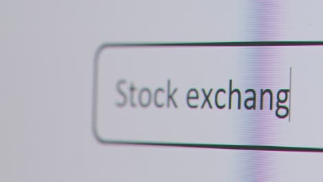 Close-Up-Of-Screen-With-Person-Typing-Stock-Exchange-Into-Computer-Search-Engine-1