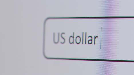 Close-Up-Of-Screen-With-Person-Typing-US-Dollar-To-Euro-Into-Computer-Search-Engine