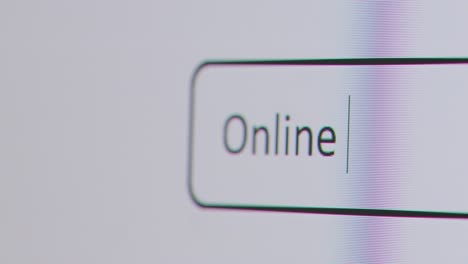 Close-Up-Of-Screen-With-Person-Typing-Online-Banking-Into-Computer-Search-Engine