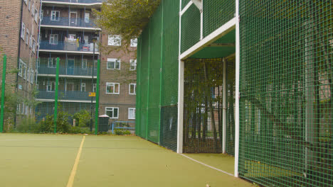 View-Of-Goal-On-Empty-Artificial-Soccer-Pitch-In-Urban-City-Area-2