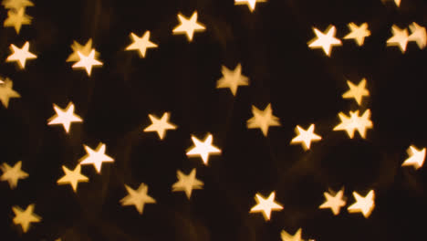 Hintergrund-Der-Weihnachtsbeleuchtung-In-Form-Von-Sternen-4