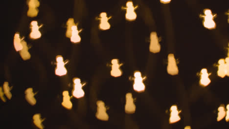 Background-Of-Christmas-Lights-In-The-Shape-Of-Snowmen-1