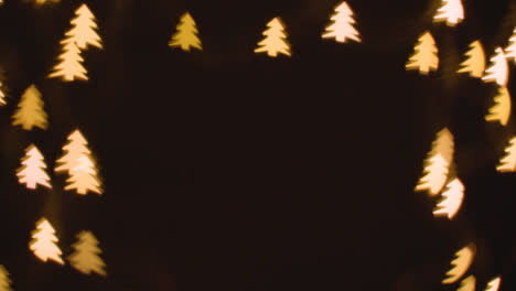 Background-Of-Christmas-Lights-In-The-Shape-Of-Christmas-Trees-With-Copy-Space