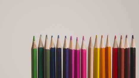 Studio-Shot-Of-Multi-Coloured-Pencils-Against-White-Background-1