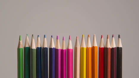 Studio-Shot-Of-Multi-Coloured-Pencils-Against-Grey-Background-1