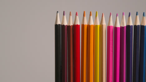 Studio-Shot-Of-Multi-Coloured-Pencils-Against-Grey-Background-3