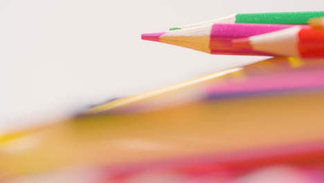 Close-Up-Shot-Of-Randomly-Arranged-Rotating-Multi-Coloured-Pencils-5