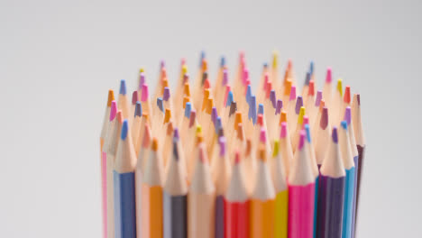 Studio-Shot-Of-Rotating-Multi-Coloured-Pencils-Against-White-Background-5