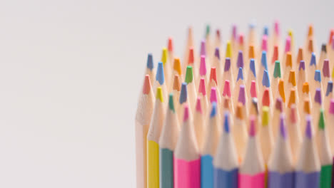 Studio-Shot-Of-Rotating-Multi-Coloured-Pencils-Against-White-Background-7