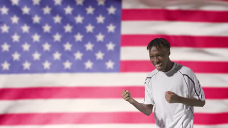 Young-Footballer-Celebrating-to-Camera-In-Front-of-USA-Flag-01