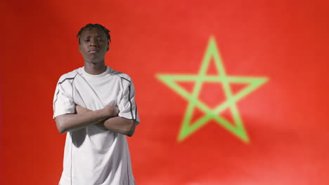 Young-Footballer-Posing-In-Front-of-Morocco-Flag-02