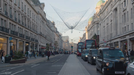 Exterior-Of-Shops-Decorated-For-Christmas-On-London-UK-Regent-Street-In-Daytime-1