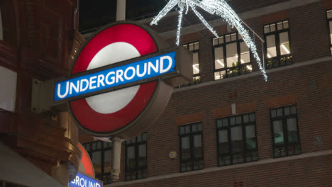 Close-Up-Of-Christmas-Lights-And-Decorations-At-Covent-Garden-Underground-Station-London-UK-At-Night