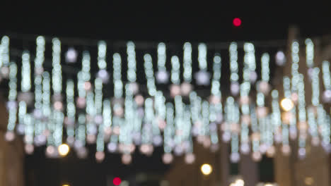 Defocused-Christmas-Light-Decorations-Across-Shops-On-London-UK-Street-At-Night-1