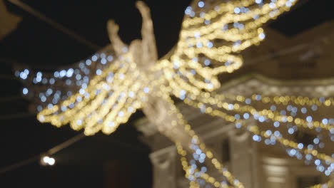 Close-Up-Of-Angel-Christmas-Light-Decoration-Across-Shops-On-London-UK-Regent-Street-At-Night-3