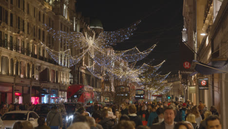 Angel-Christmas-Light-Decorations-Across-Shops-On-London-UK-Regent-Street-At-Night-1