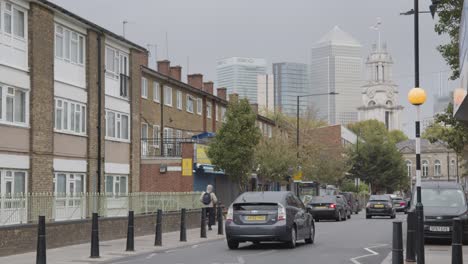 Contrast-Between-Poor-Inner-City-Housing-Development-And-Offices-Of-Wealthy-Financial-Institutions-London-Docklands-UK