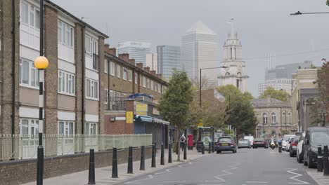 Contrast-Between-Poor-Inner-City-Housing-Development-And-Offices-Of-Wealthy-Financial-Institutions-London-Docklands-UK-1