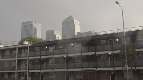 Contrast-Between-Poor-Inner-City-Housing-Development-And-Offices-Of-Wealthy-Financial-Institutions-London-Docklands-UK-4