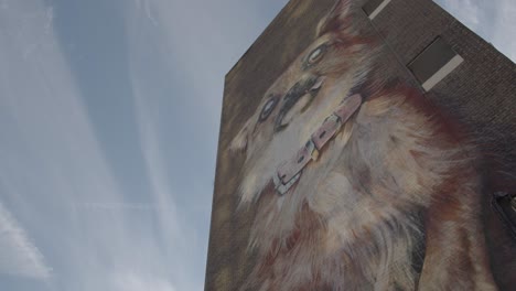 Mural-Of-Dog-Painted-Onto-Inner-City-Housing-Development-In-Tower-Hamlets-London-UK
