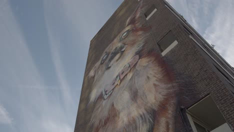 Mural-Of-Dog-Painted-Onto-Inner-City-Housing-Development-In-Tower-Hamlets-London-UK-1