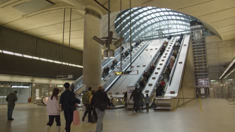 Passengers-On-Escalators-At-Canary-Wharf-Underground-Station