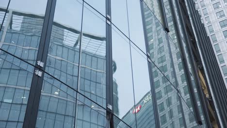Reflection-of-Citi-Bank-And-HSBC-Offices-In-Windows-Of-Buildings-In-London-Docklands-UK