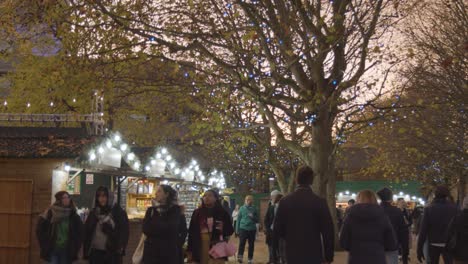 Busy-Christmas-Market-Stalls-On-London-South-Bank-At-Dusk