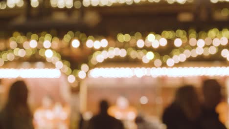 Defocused-Lights-On-Food-And-Drink-Stalls-At-Frankfurt-Christmas-Market-In-Victoria-Square-Birmingham-UK-At-Night