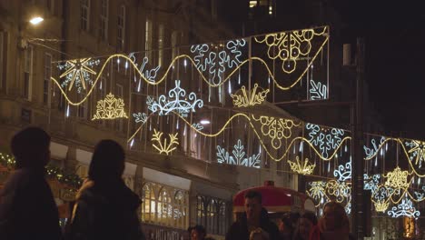 Christmas-Lights-Above-Shops-In-New-Street-In-Birmingham-UK-At-Night