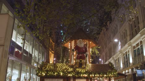 Santa-Claus-Christmas-Decoration-In-New-Street-In-Birmingham-UK-At-Night