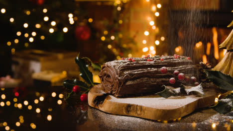 Christmas-Food-At-Home-And-Traditional-Yule-Log-Dusted-With-Icing-Sugar-On-Table-2