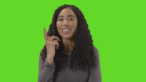 Portrait-Of-Woman-Being-Inspired-By-Good-Idea-Against-Green-Screen-At-Camera-2
